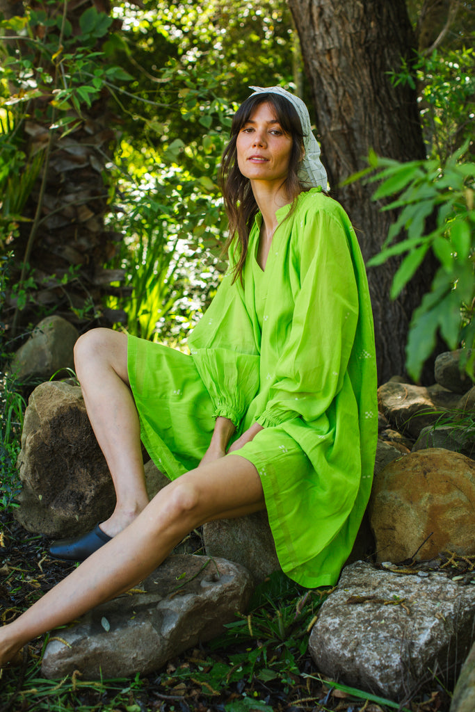 This Pride of Crow mini dress is made in collaboration between Erica Kim and World of Crow, it has a frilled round V-neckline, Sorbet green colour, A-line flare, Drop shoulders, Long gathered cuff sleeves, side pockets, Oversized fit in Jamdani fabric