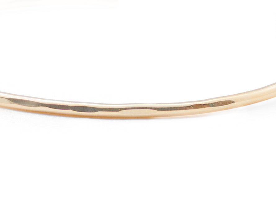 Introducing a beautifully crafted rose gold cuff bracelet, designed with two delicate wires. Available in both smooth and hammered finishes, this elegant piece is offered in sizes ranging from X-Small to Large, with custom sizing options to ensure a perfect fit.