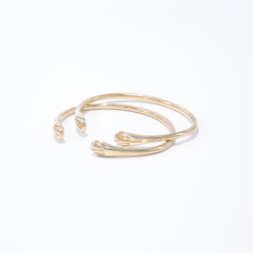 Introducing our hand-casted gold cuff bracelet, crafted from seapods gathered along the North Fork LI shores. Made from sustainable recycled brass, this bracelet is available in sizes S and M/L. Each piece supports marine habitat restoration, reflecting a commitment to both elegance and environmental stewardship.