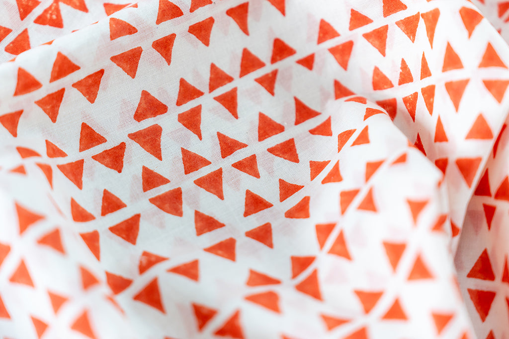 Our skirt in close-up, the vibrant color and motif, hand blocked design, natural colors in focus