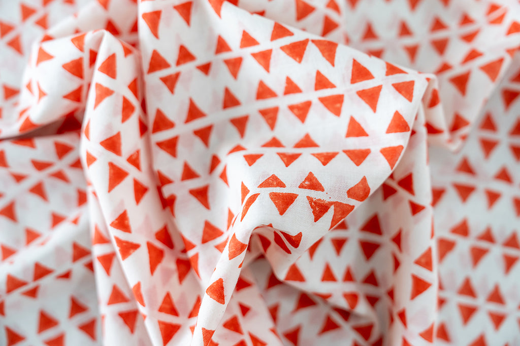 Our skirt in close-up, the vibrant color and motif, hand blocked design, natural colors in focus