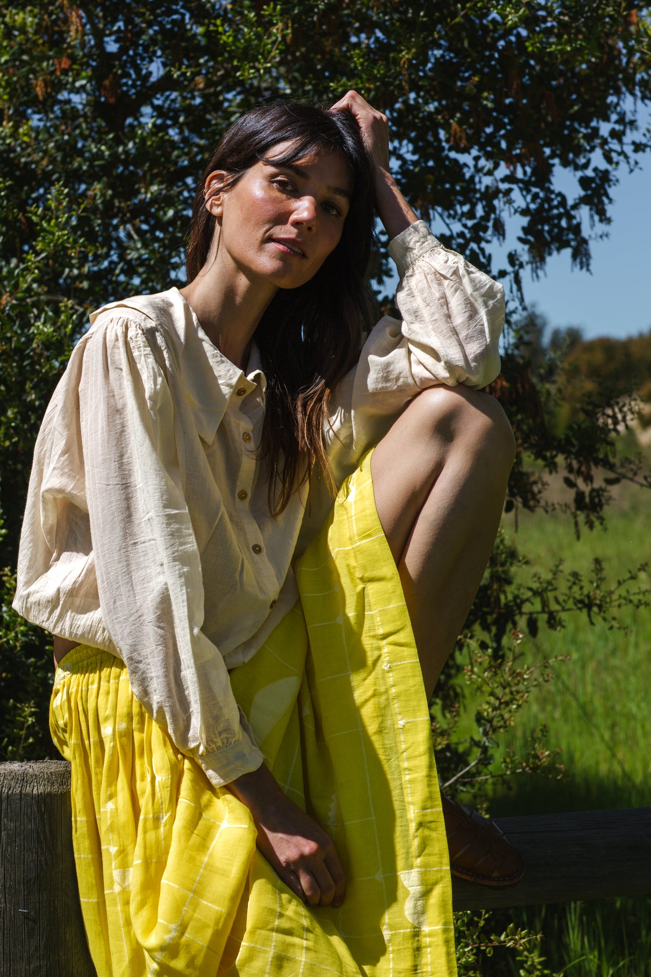 Introducing the Vintage Bertha Blouse, a timeless summer staple exuding effortless charm. Crafted from handwoven cotton in a serene off-white hue, it offers versatility and breathability for warmer days. Boasting a classic bertha collar, three-quarter sleeves, and a straight hem, this blouse epitomizes understated elegance. Pair it with any bottom for a stylish ensemble suitable for any occasion.
