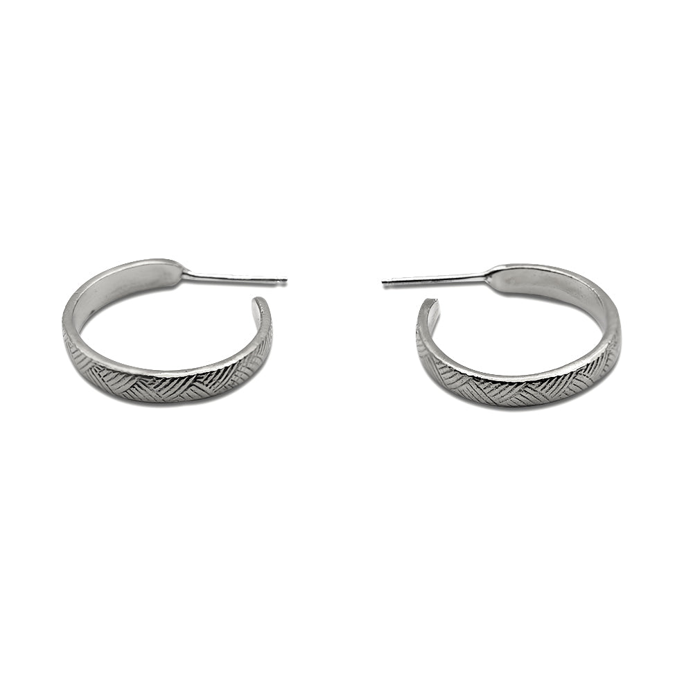 Introducing our vintage-inspired sterling silver hoop earrings, elegantly designed with a graceful curve. Available in small, medium, and large sizes, these hoops offer timeless sophistication and versatility. Handcrafted in solid sterling silver, they are a perfect choice for adding a touch of refined style to any outfit.