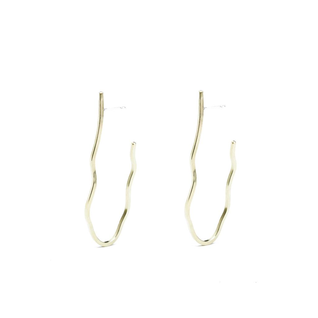 Introducing our Atoll-Shaped Hoops, crafted in solid recycled sterling silver and gold-fill, available in sizes S and M. Handcrafted in our NY studio, each unique hoop features solid sterling silver posts and backs, forged by hand with ethically sourced metals to reflect the distinctive beauty of an atoll.