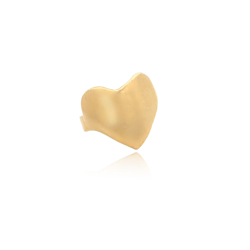 Introducing the Eros Gold Heart Signet Ring, a chunky heart-shaped ring crafted from an original wax sculpture, perfect for any occasion. Inspired by the Greek god of love, this timeless accessory is made from recycled metals and is available in gold, brass, or silver. With its organic shape and surface, this ring serves as a gentle reminder to love yourself.