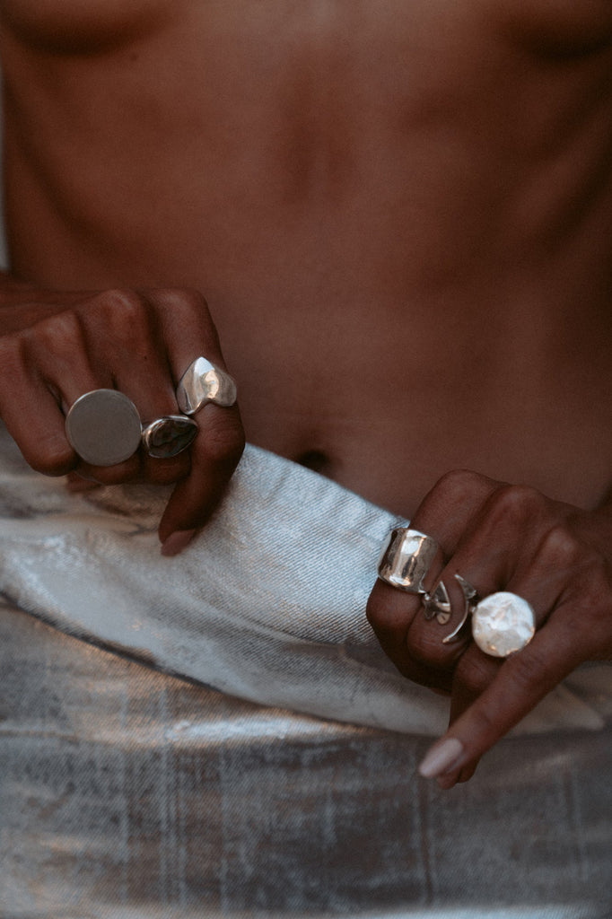 Introducing the Eros Heart Ring, a luxurious signet style crafted from an original wax sculpture and cast in recycled sterling silver. Named after the Greek god of love, this chunky ring is available in brass, gold plated, and 14k gold. Each piece is made to order with meticulous care, perfect for elevating any occasion.