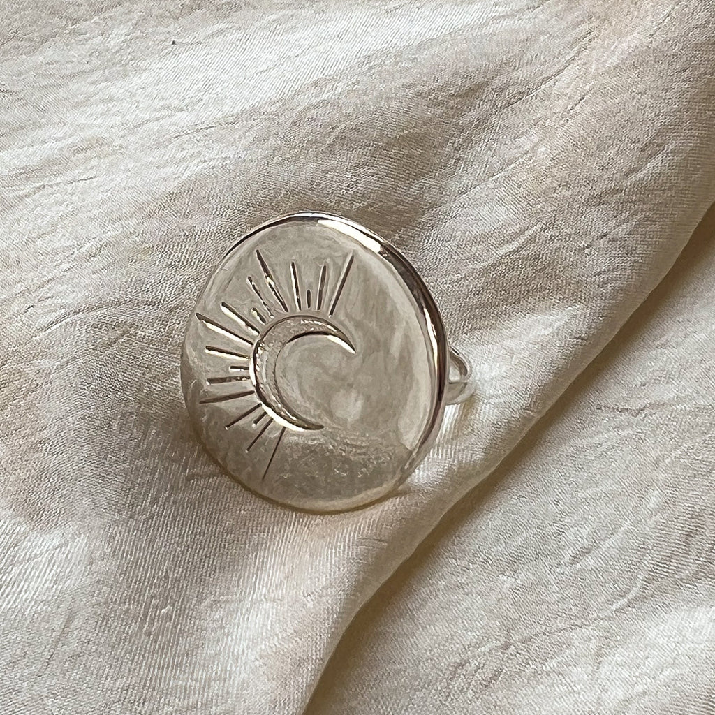 Introducing the Nocturne Sterling Silver Crescent Moon Ring, a symbol of regeneration and rebirth, meticulously handcrafted in Los Angeles. This elegant and timeless piece captures the essence of celestial beauty with its recycled sterling silver design. A graceful reminder to stay connected with your true self, this ring is a perfect blend of sophistication and meaning.