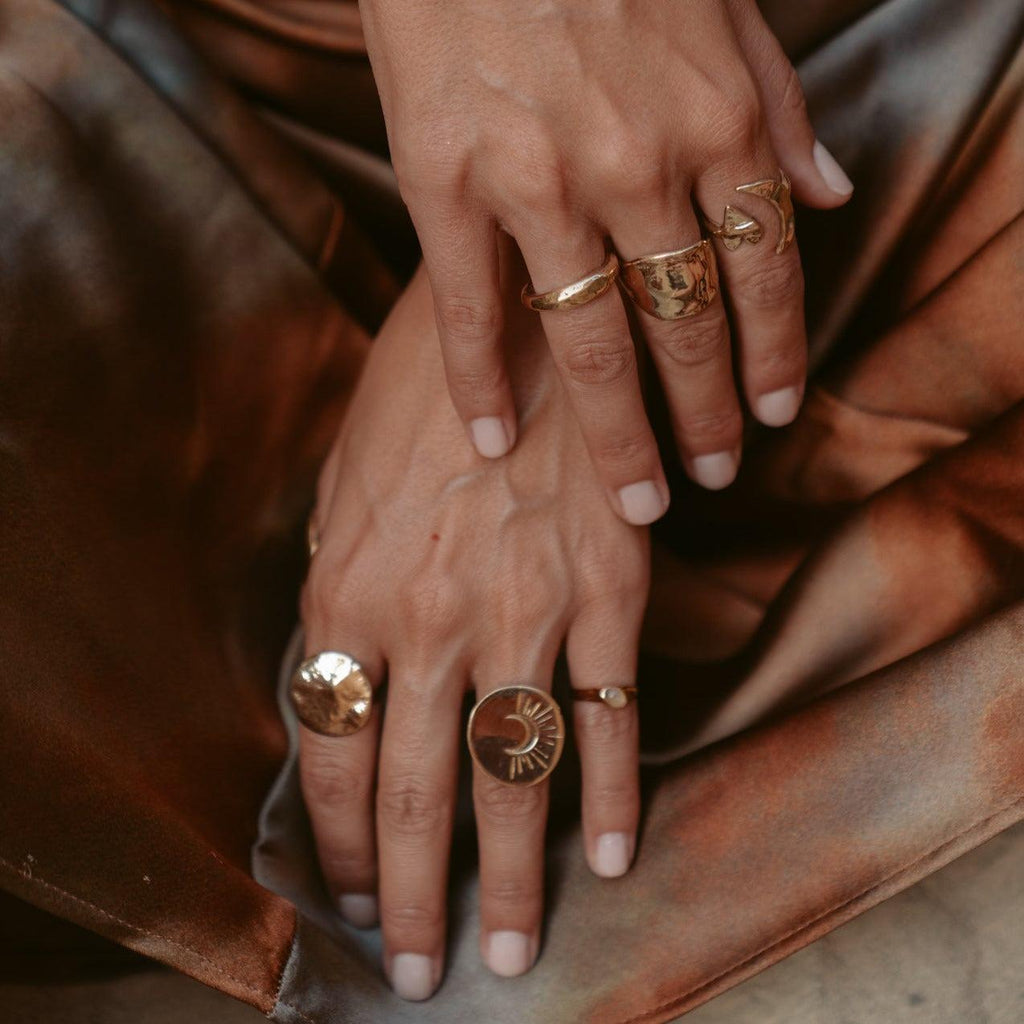 Introducing the Nocturne Sterling Silver Crescent Moon Ring, a symbol of regeneration and rebirth, meticulously handcrafted in Los Angeles. This elegant and timeless piece captures the essence of celestial beauty with its recycled sterling silver design. A graceful reminder to stay connected with your true self, this ring is a perfect blend of sophistication and meaning.