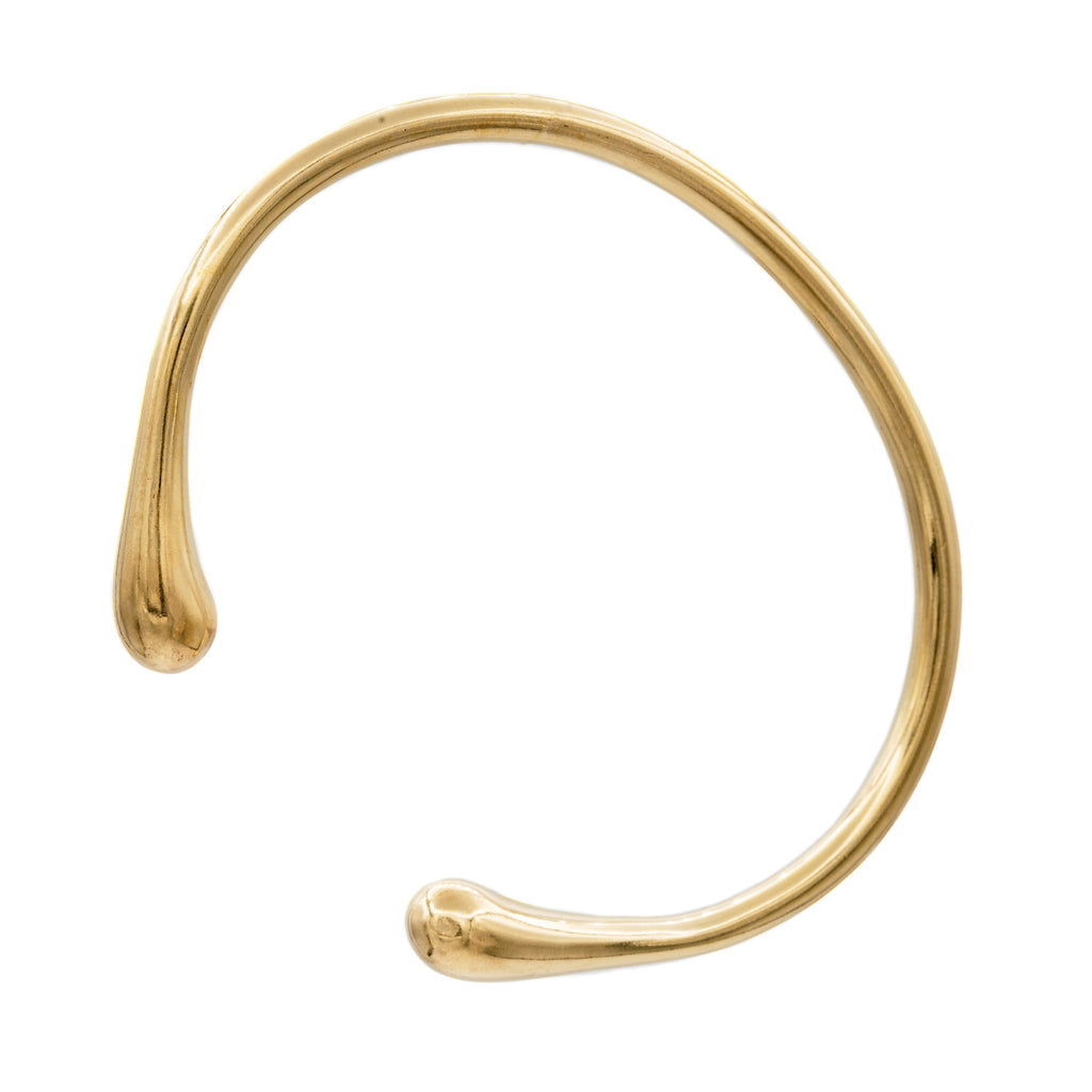 Introducing the Sustainable Gold Cuff Bracelet, cast from seapods found along North Fork shores. Available in Small (5 1/2”) and Medium/Large (6”) sizes, this flexible piece supports marine research. Combining eco-conscious craftsmanship with a commitment to environmental preservation, it offers a unique, timeless addition to any collection.