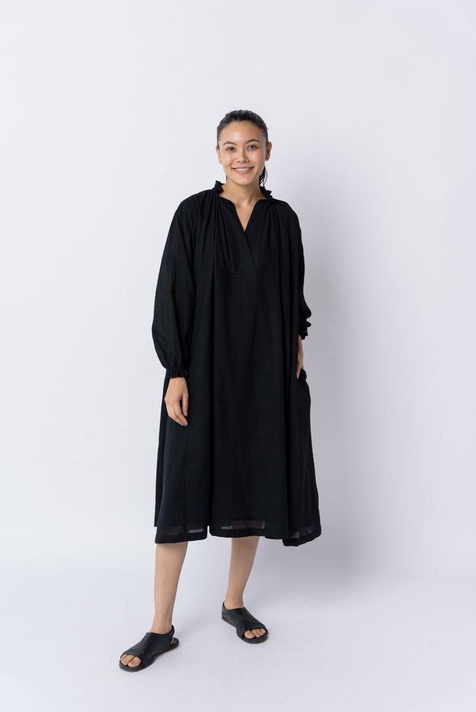 Jet black flared dress, ethical and sustainable clothing, ethical clothing brands, organic cotton women's tops, organic fashion clothing, organic clothing, organic cotton ladies clothing, best clothing brands for young women, best quality women's clothing, elegant minimalist fashion, how many items in a minimalist wardrobe