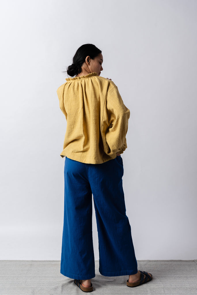  Oversized mustard wide top, eco fashion clothing, ethical and sustainable clothing, cotton clothing company, natural cotton clothing, American women's clothing, American women's clothing stores, organic cotton retailers, organic cotton shop, create a minimalist closet, dark minimalist fashion