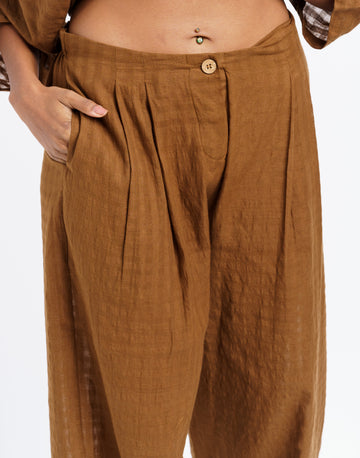 Textured checked pleated trousers, best sustainable clothing brands, best sustainable women's clothing, organic cotton wear, organic dresses online, cotton only clothing, cotton only clothing store, women's organic dresses, lightweight cotton women's clothing, clothing brands for minimalists, design minimalist wardrobe